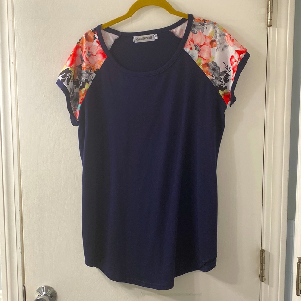 Navy blue and floral tee.